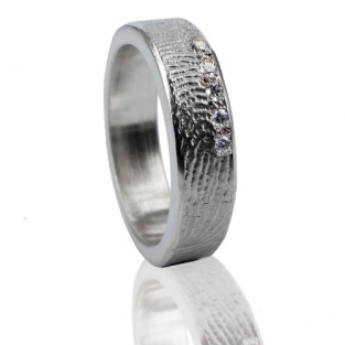 Zilveren ring met vingerafdruk en vijf stenen